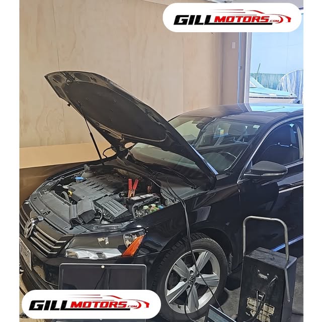 Volkswagen with its hood open inside the workshop, from Gill Motors Instagram